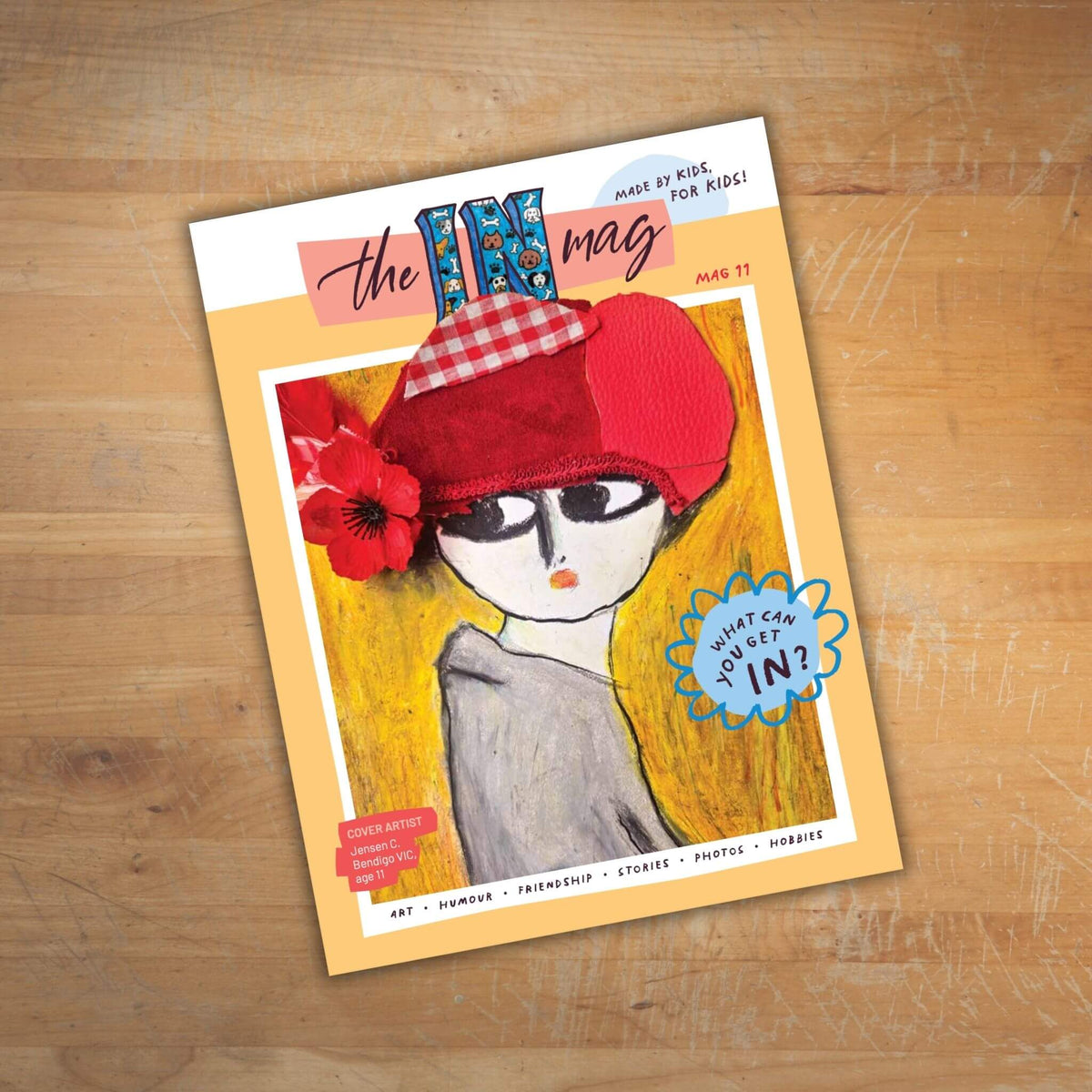 theINmag Mag11 on a timber benchtop - inside page sample