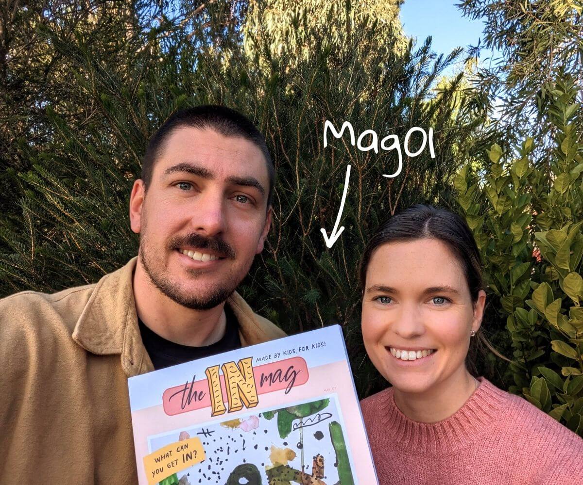 Ryan and Tam, the two former teachers behind theINmag, holding a copy of the magazine.