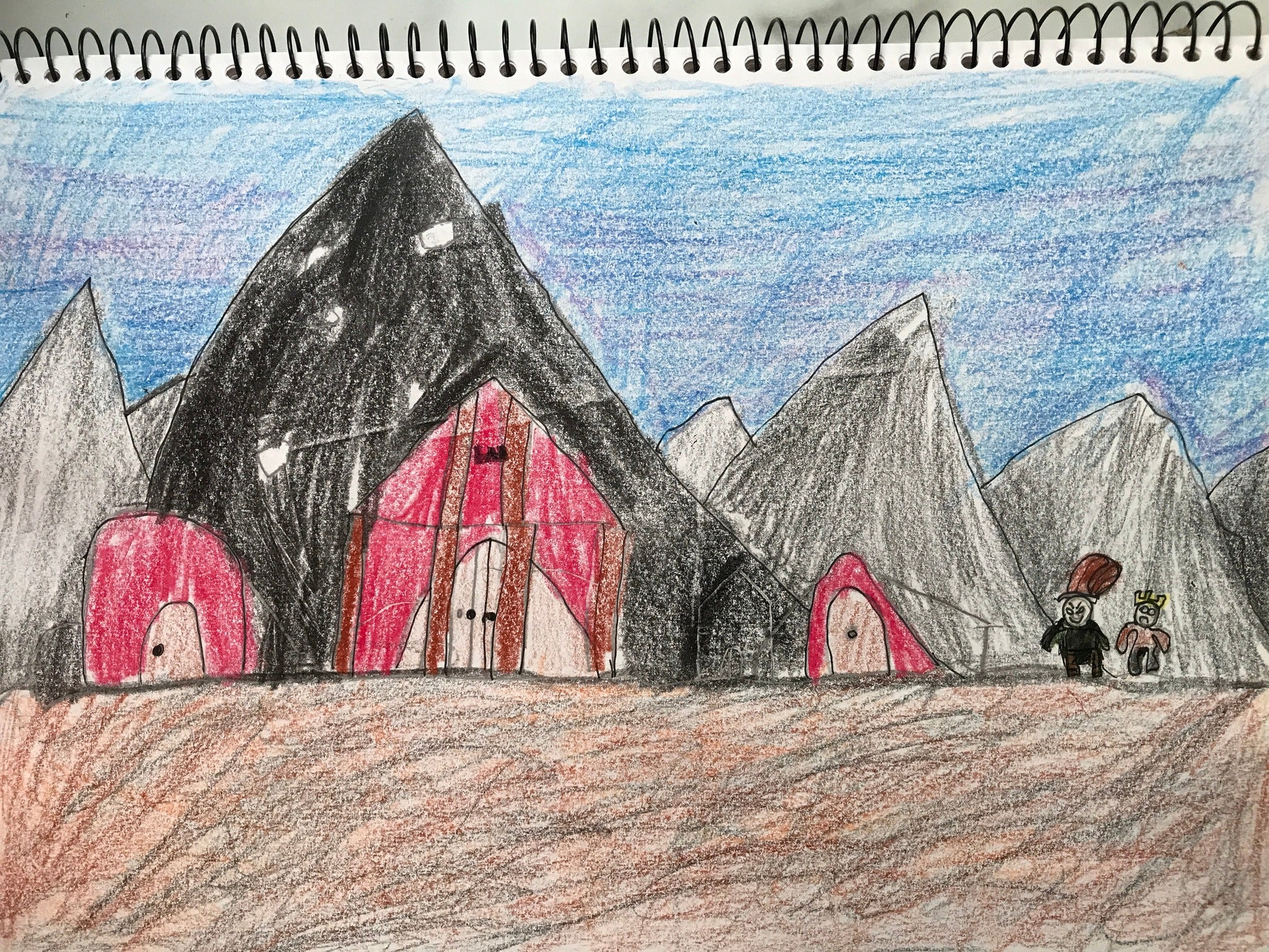 The Mountain Kingdom village with red doors set into the peaks