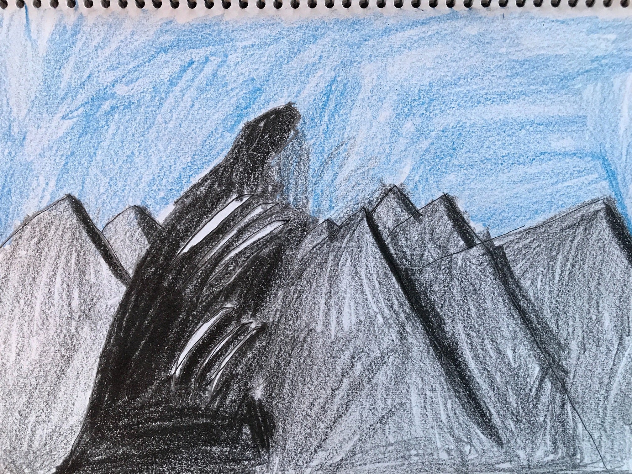 Giant claw marks gouged down the side of a mountain