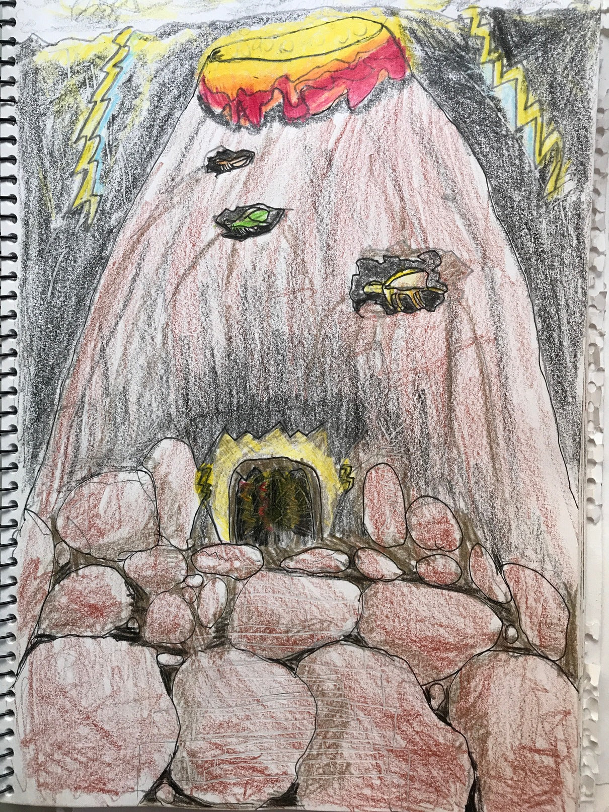 The biggest volcano in sight, with a glowing cave entrance